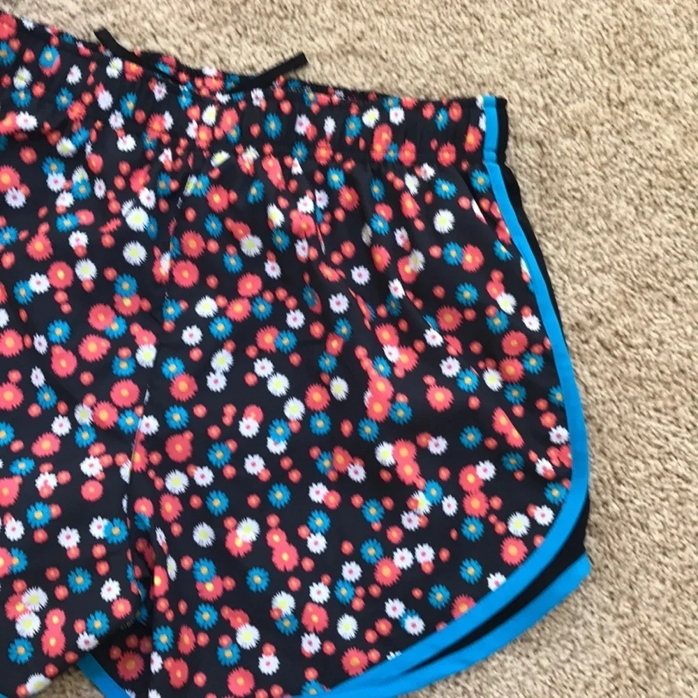 NWT! NIKE black with blue multi combo Size M running shorts